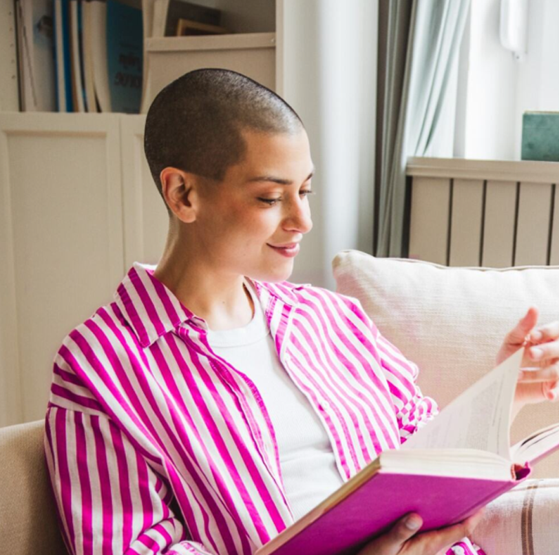 Young woman reading a book